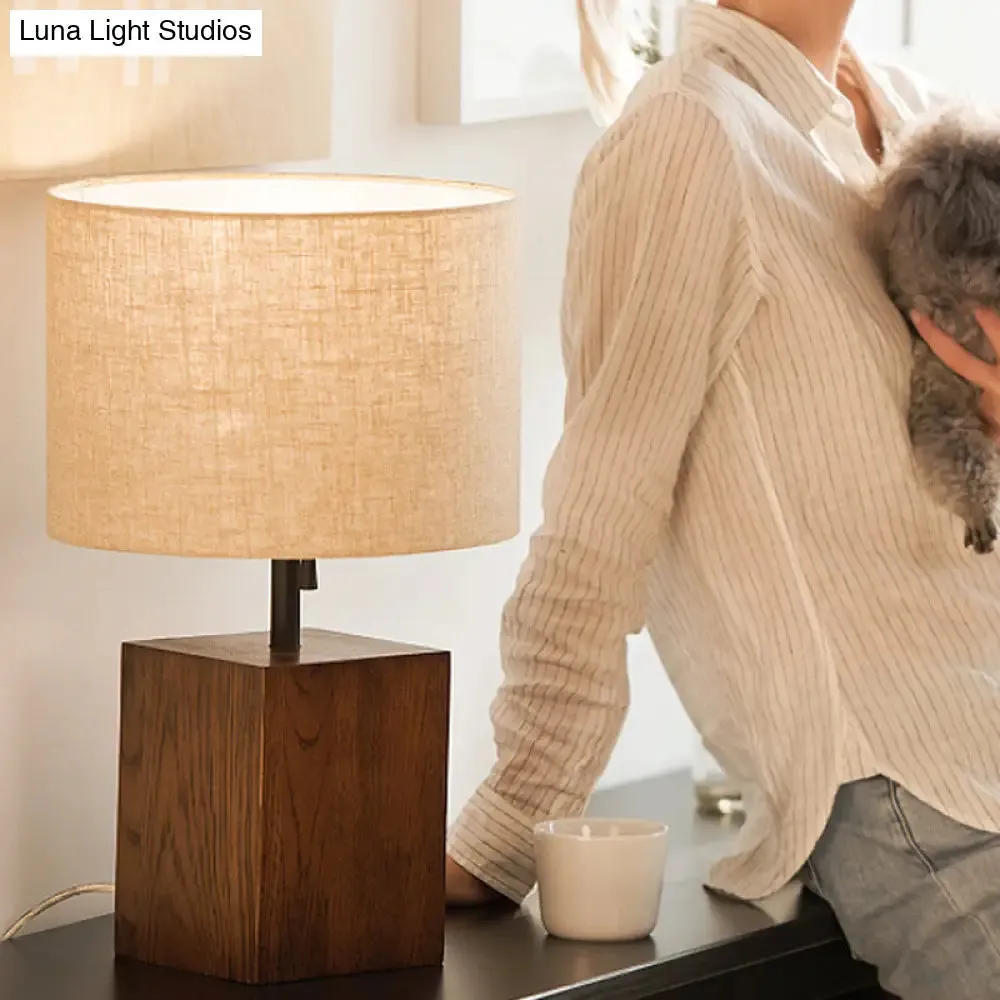Modern Flaxen Cylinder Desk Light with Brown Rectangular Wood Base