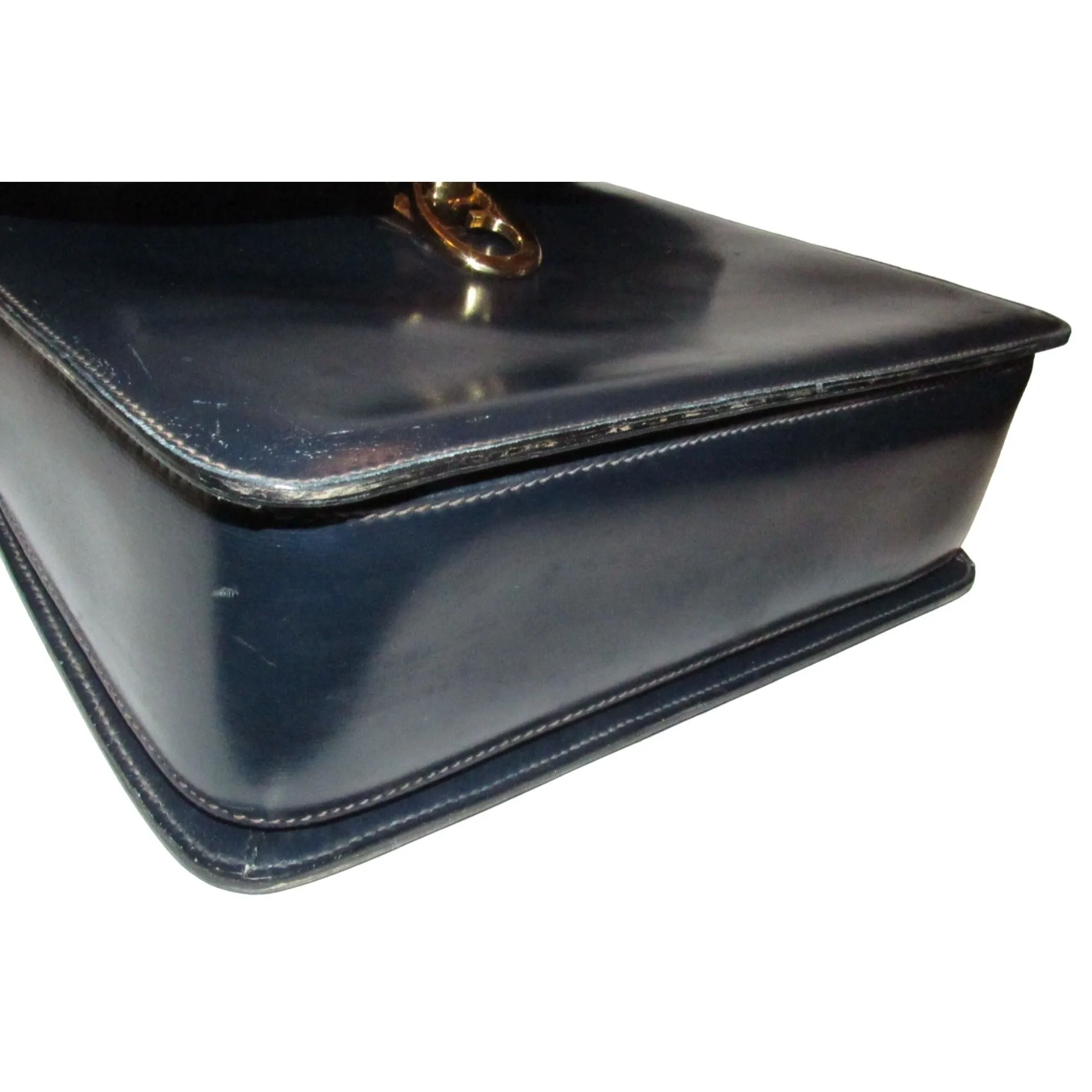 One of a kind, early Gucci, 1960's mod, hard and boxy, structured, navy leather, top handle shoulder bag with gold, equestri
