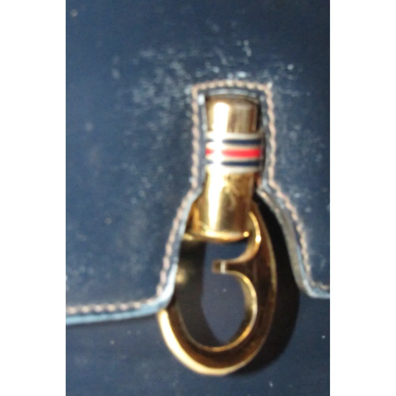One of a kind, early Gucci, 1960's mod, hard and boxy, structured, navy leather, top handle shoulder bag with gold, equestri