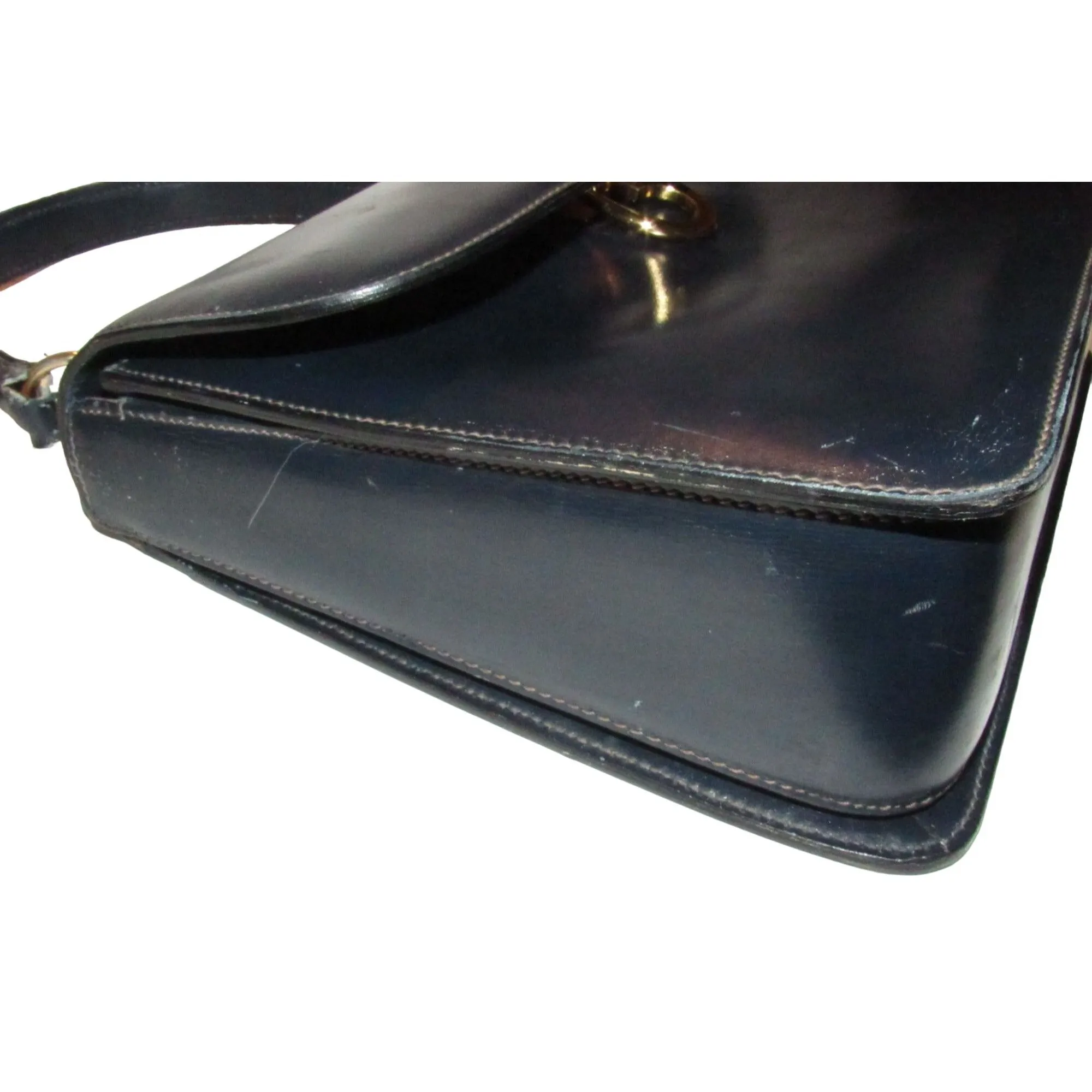 One of a kind, early Gucci, 1960's mod, hard and boxy, structured, navy leather, top handle shoulder bag with gold, equestri