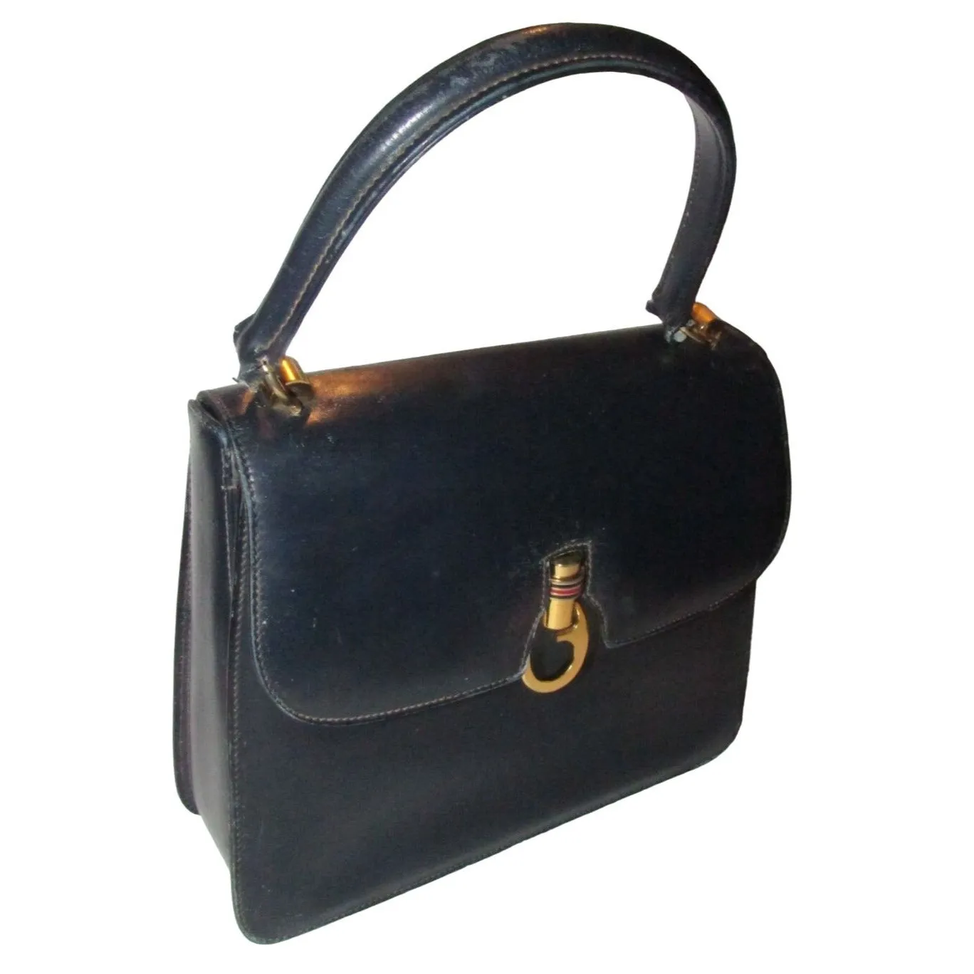 One of a kind, early Gucci, 1960's mod, hard and boxy, structured, navy leather, top handle shoulder bag with gold, equestri