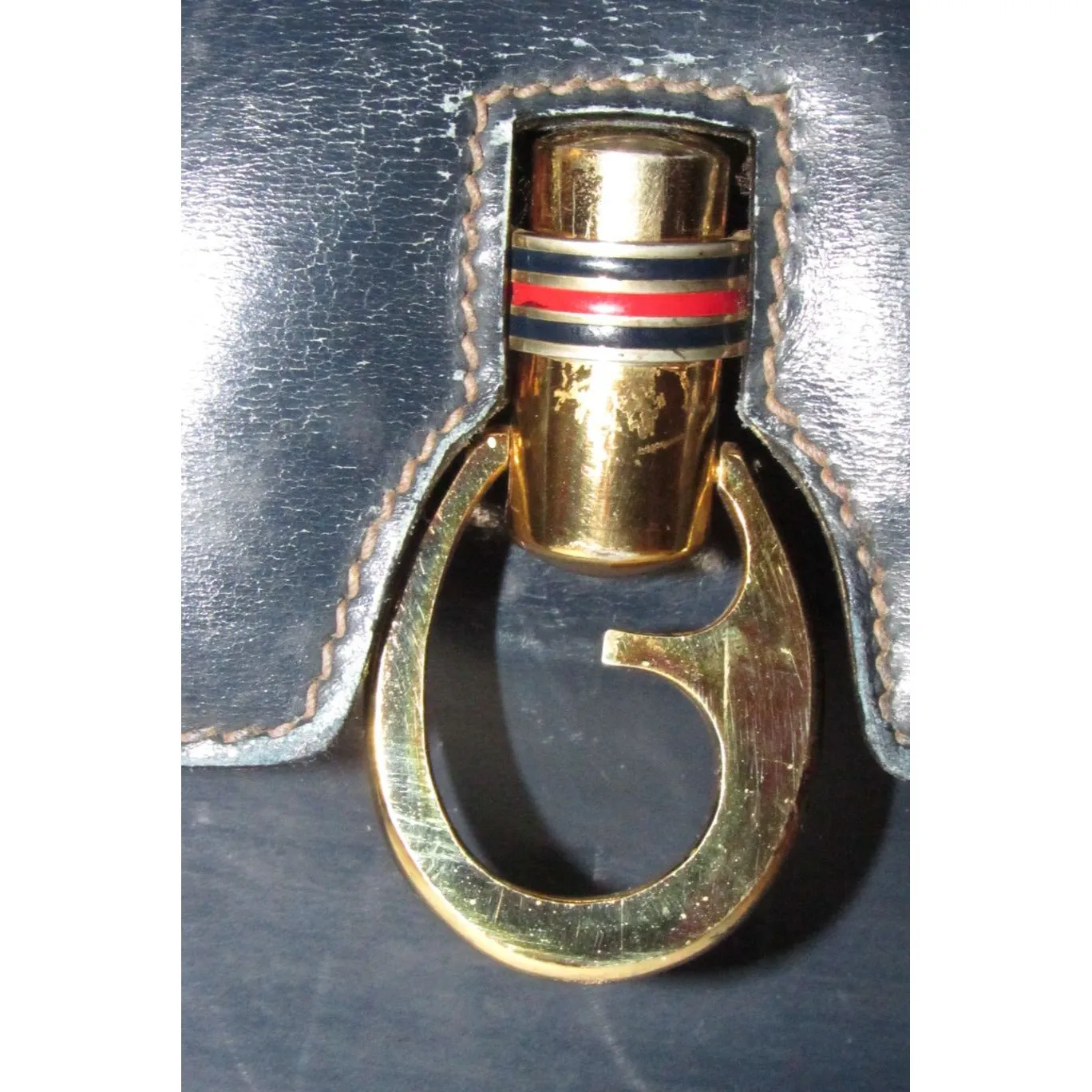One of a kind, early Gucci, 1960's mod, hard and boxy, structured, navy leather, top handle shoulder bag with gold, equestri