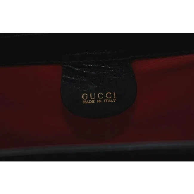 Tom Ford era, Gucci, midnight blue leather, roomy, Bamboo line, two-way top-handle shoulder purse with a bamboo clasp, gold tone hardware, a snap top closure, and a removable strap